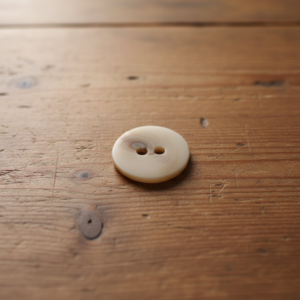 Melerade knappar 23 mm