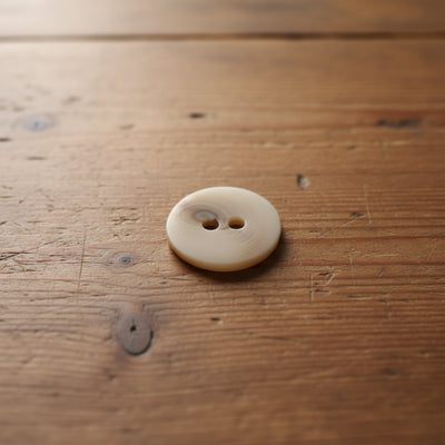 Melerade knappar 23 mm